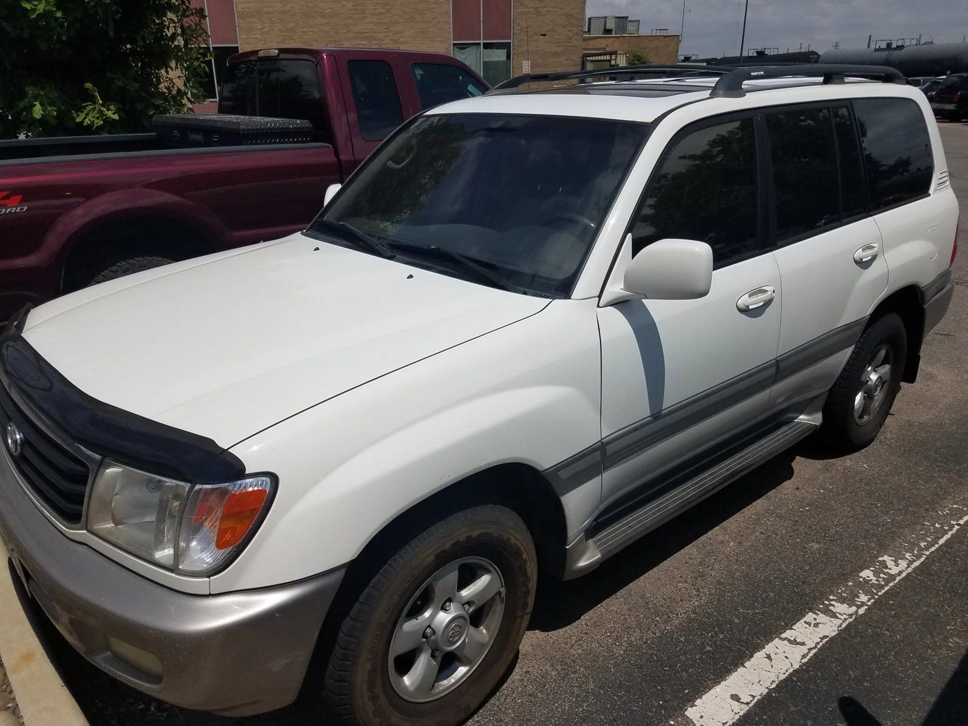 2000 White Land Cruiser 300k $5900 DENVER CO