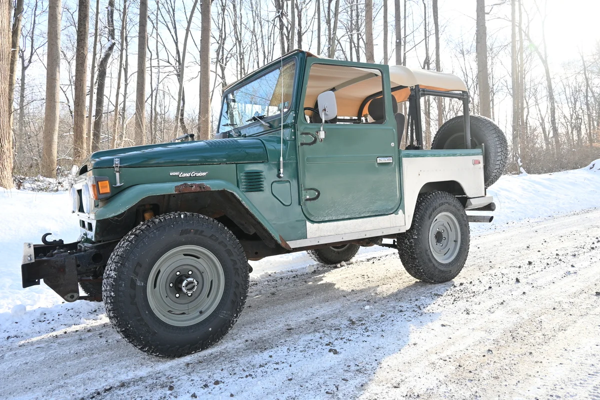 FJ40 with Custom Stainless body tub with custom bikini top and Fifteen52 Wheels
