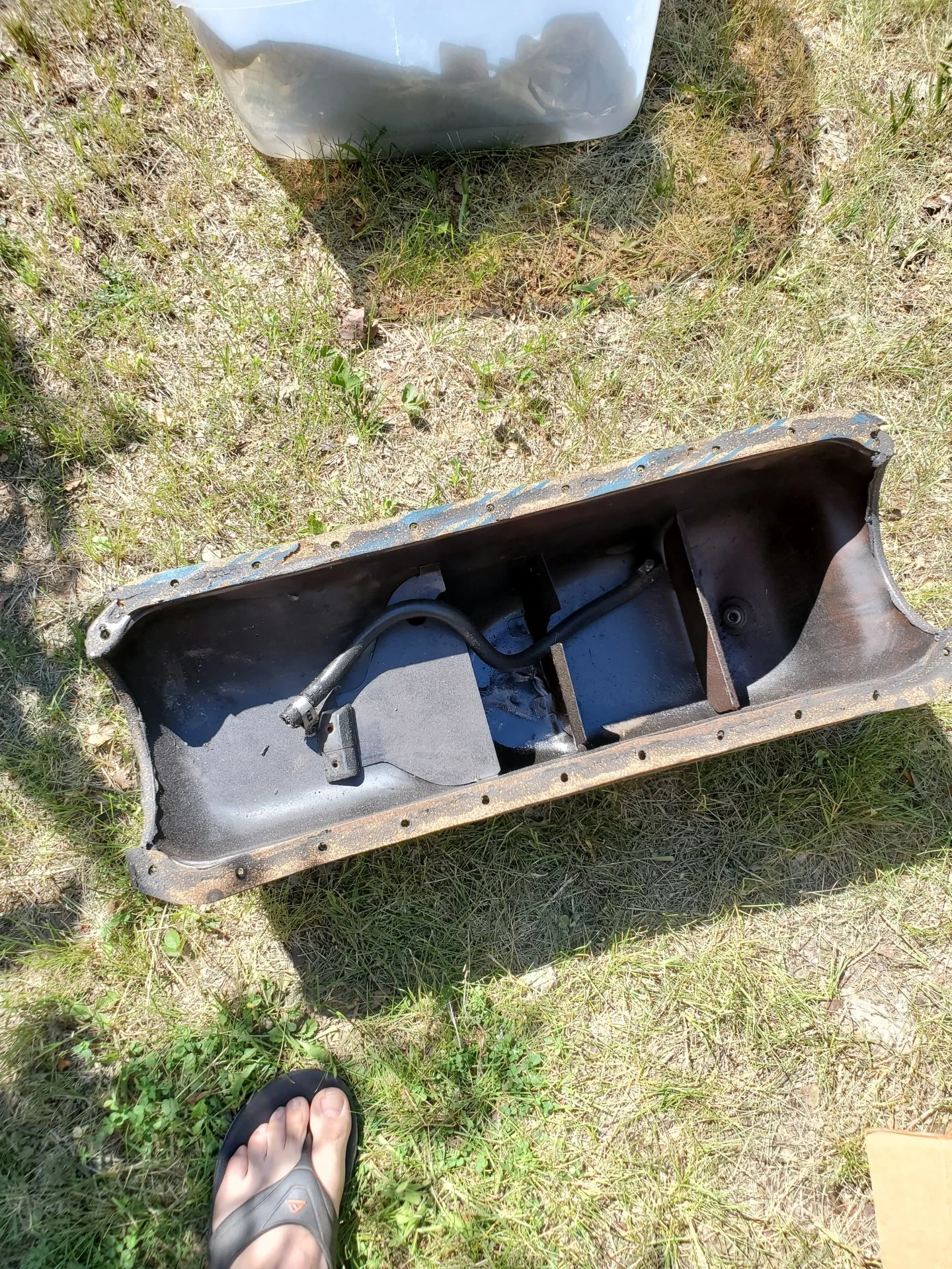 2F oil pan with small hole.webp