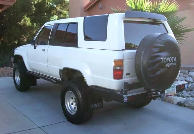 4Rnr_left_rear.webp