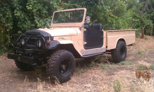 '65 tan FJ45 side view.webp