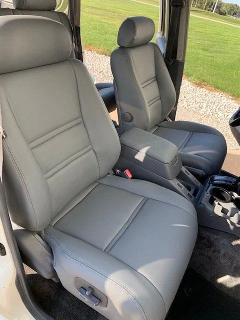 80 new front seats.webp