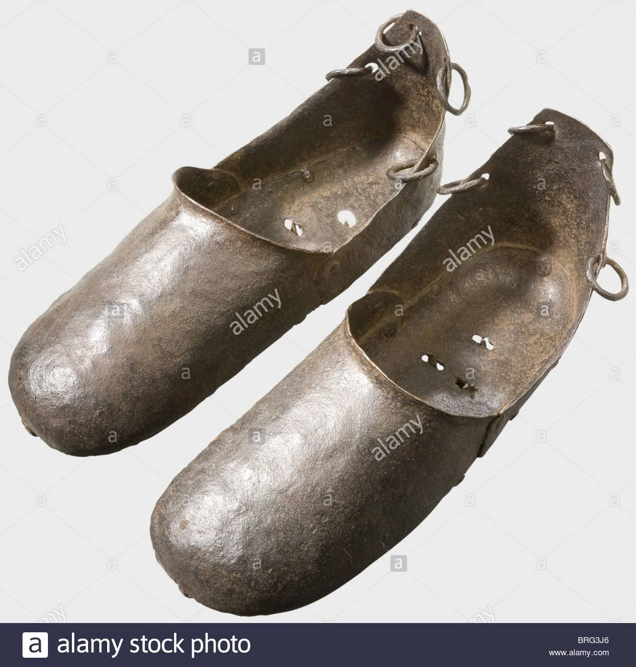 a-pair-irontshoes-16th17th-century-forged-iron-overshoes-BRG3J6.jpg