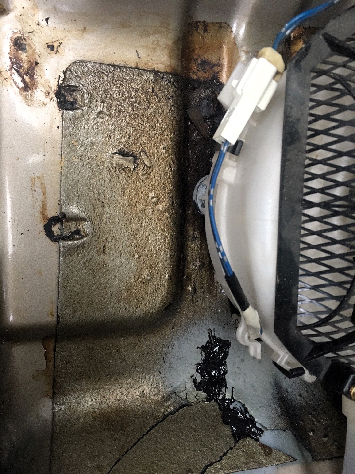 Accumulator Access2 sealed access holes-under front seat.JPG