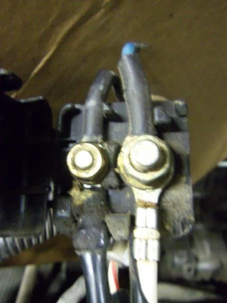 Alternator large white wire on right from alternator B post.webp