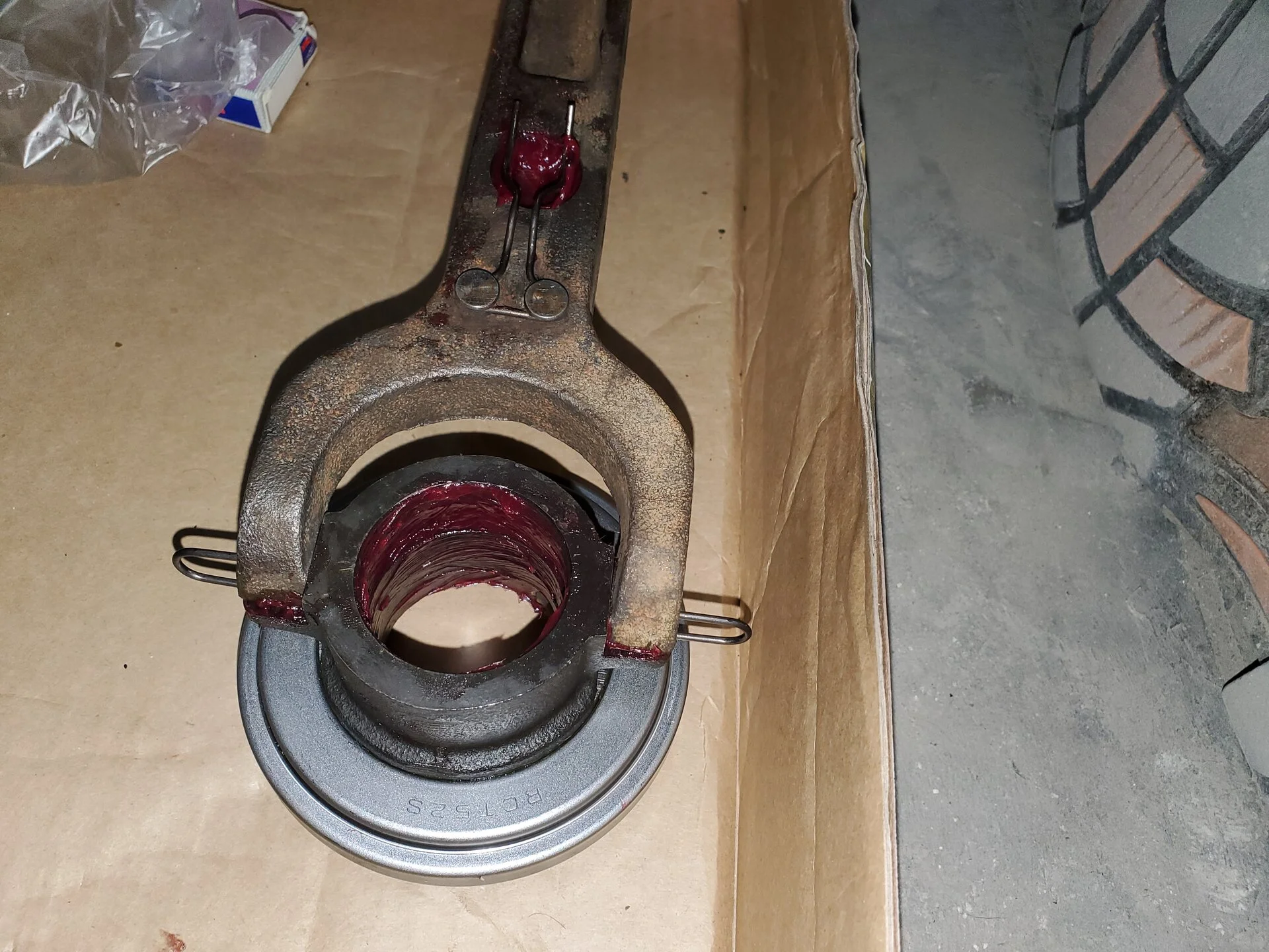 ATTATCHED THE TO BEARING TO THE FORK WITH NEW CLIPS.jpg