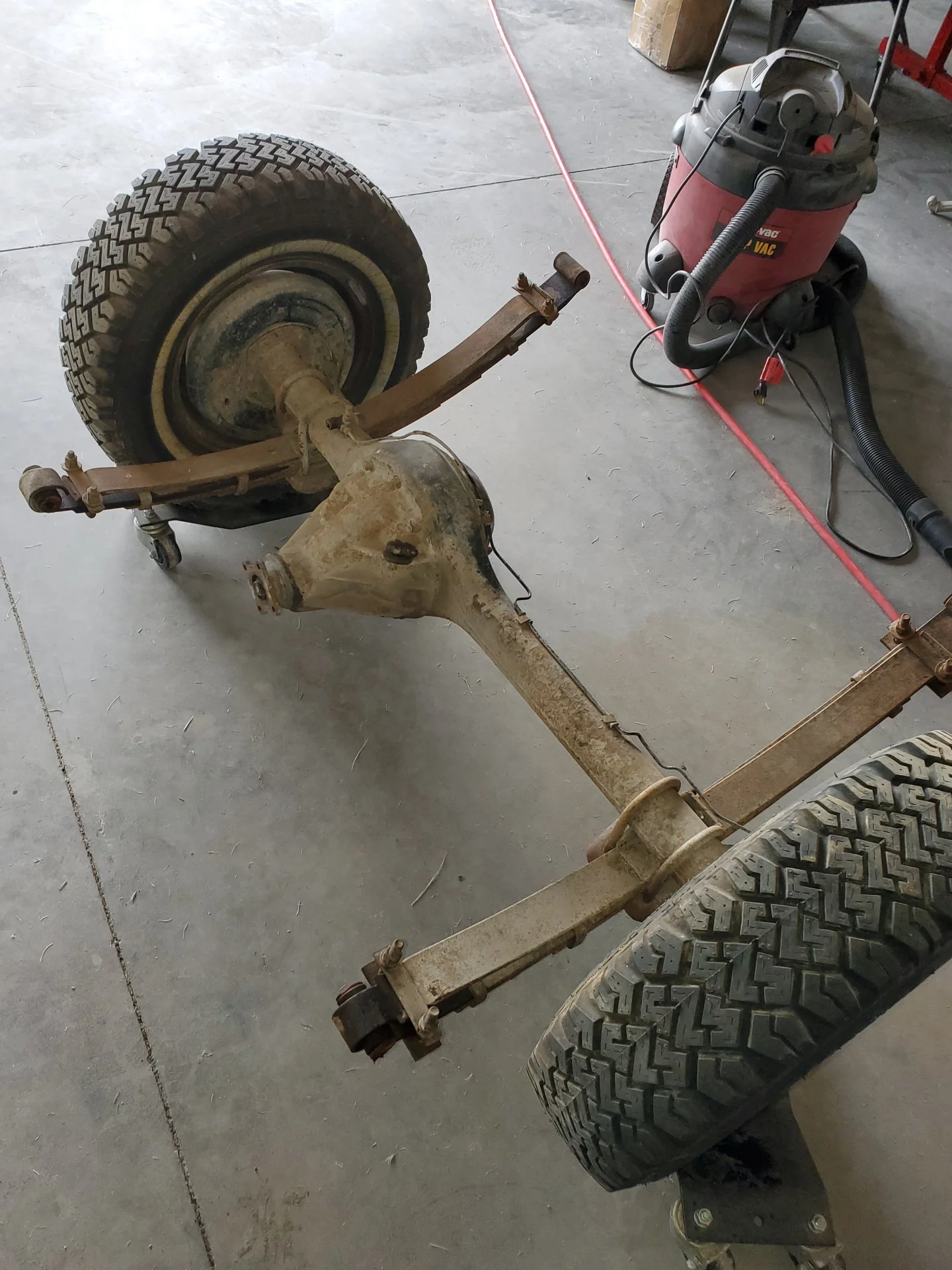 AXLE OUT ON THE FLOOR.webp