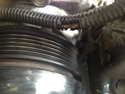 belt rub wire casing breach.webp