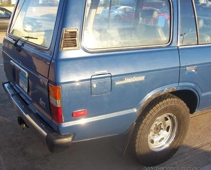 Blue 60 pass rear quarter.webp