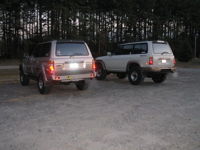 both trucks sitting in the lot rear.webp