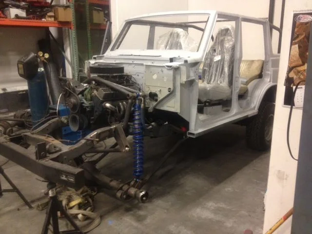 Cage with handles front shocks installed.JPG