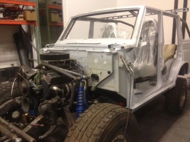 Cage with handles front shocks with tires.JPG