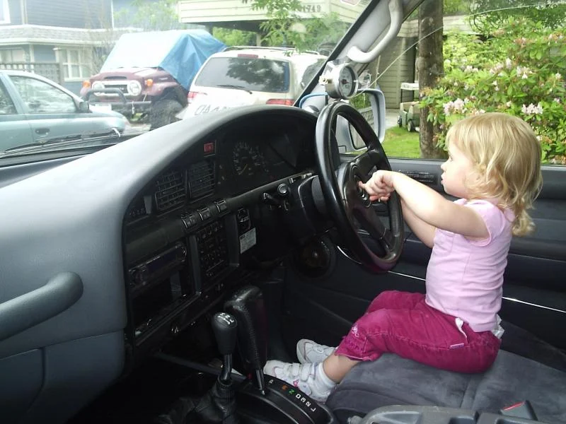 Cassidy in drivers seat.webp