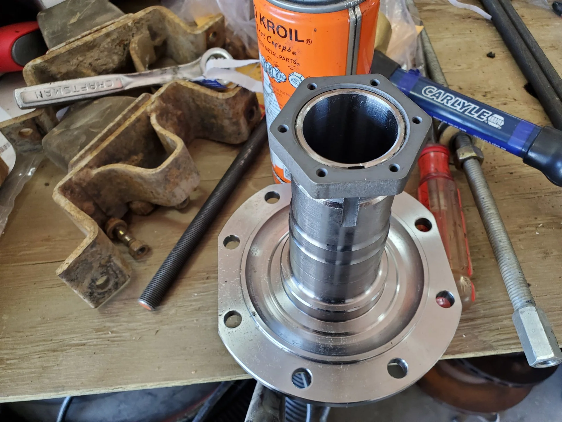 CHASED THE TREADS ON BOTH NEW SPINDLES UNTILL THE NEW NUTS THREAD ON BY HAND.webp