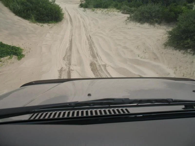 corrolla beach driving going downhill.webp