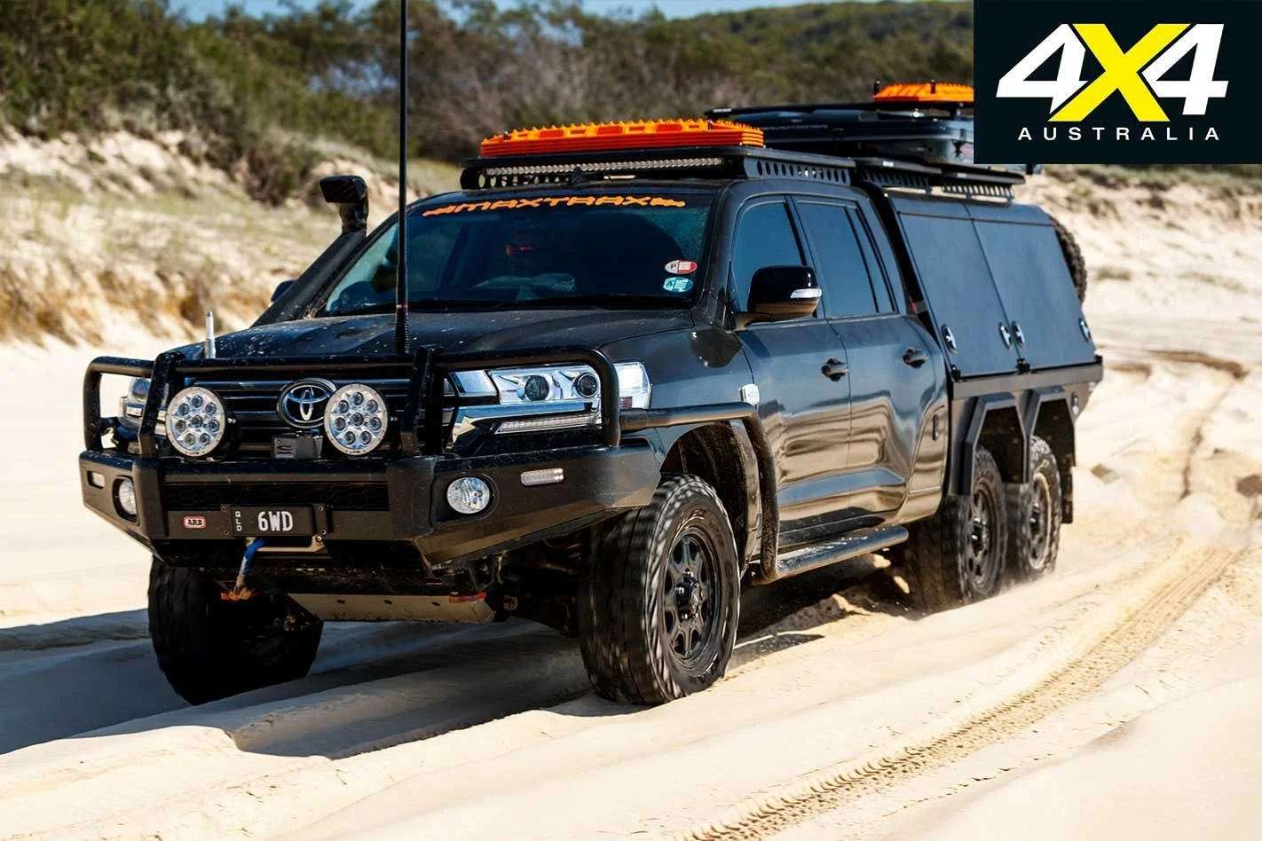 Custom-Toyota-Land-Cruiser-200-6x6-sand-driving.webp