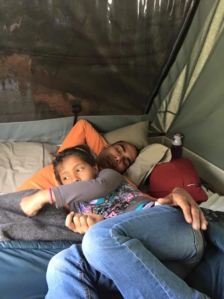 Daddy sleeping in Roo.webp
