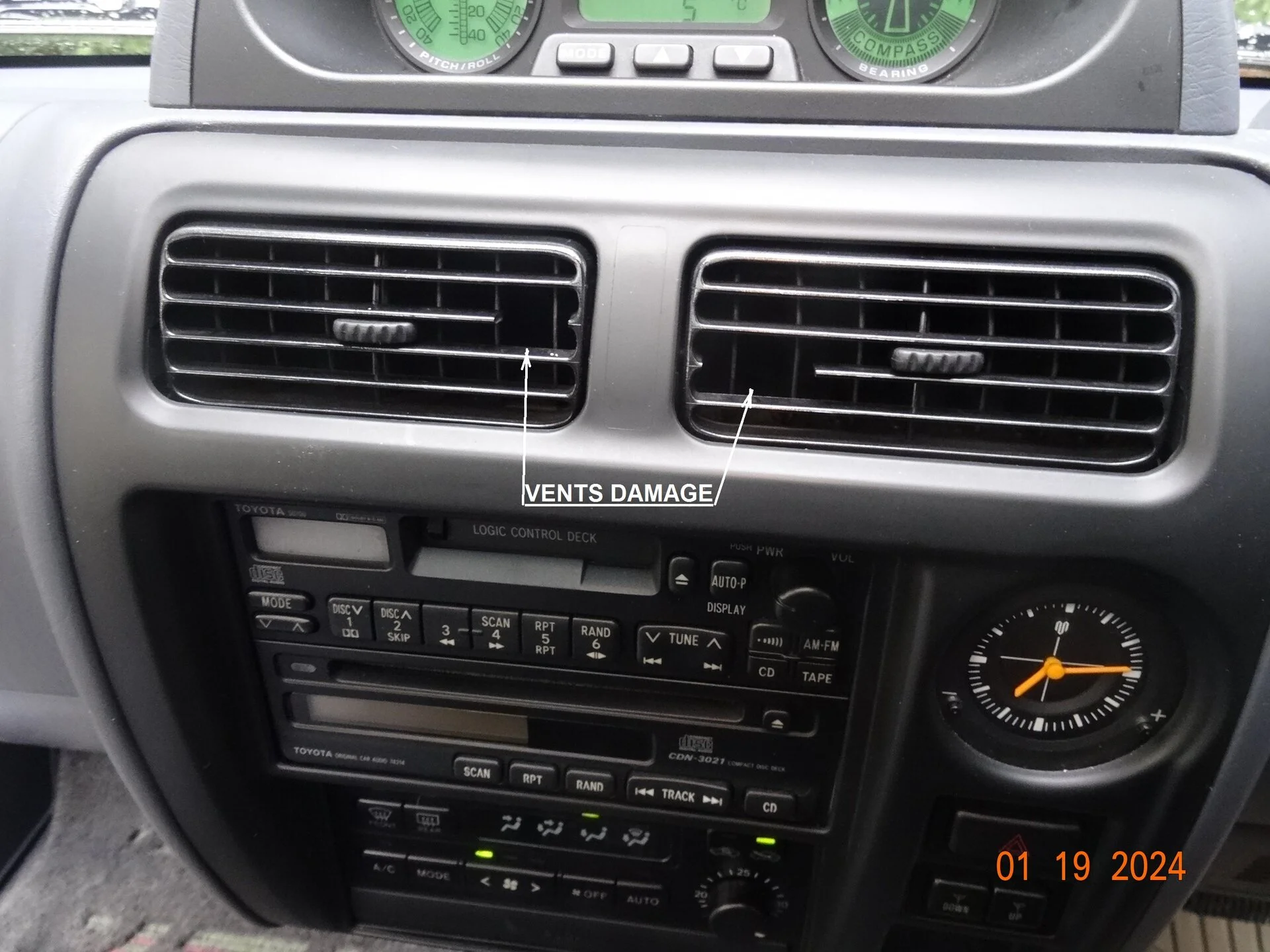 Dash center vents damage.JPG