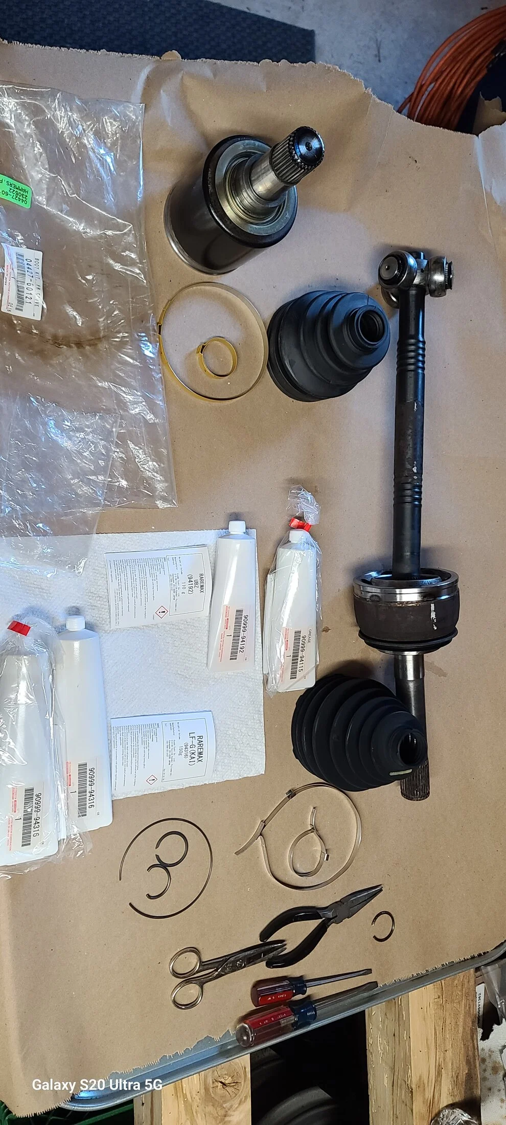Disassembled shaft and boot kit.jpg