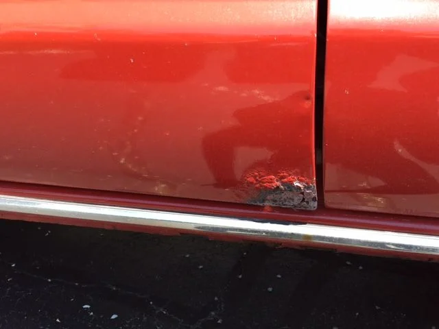 driver door rust.webp