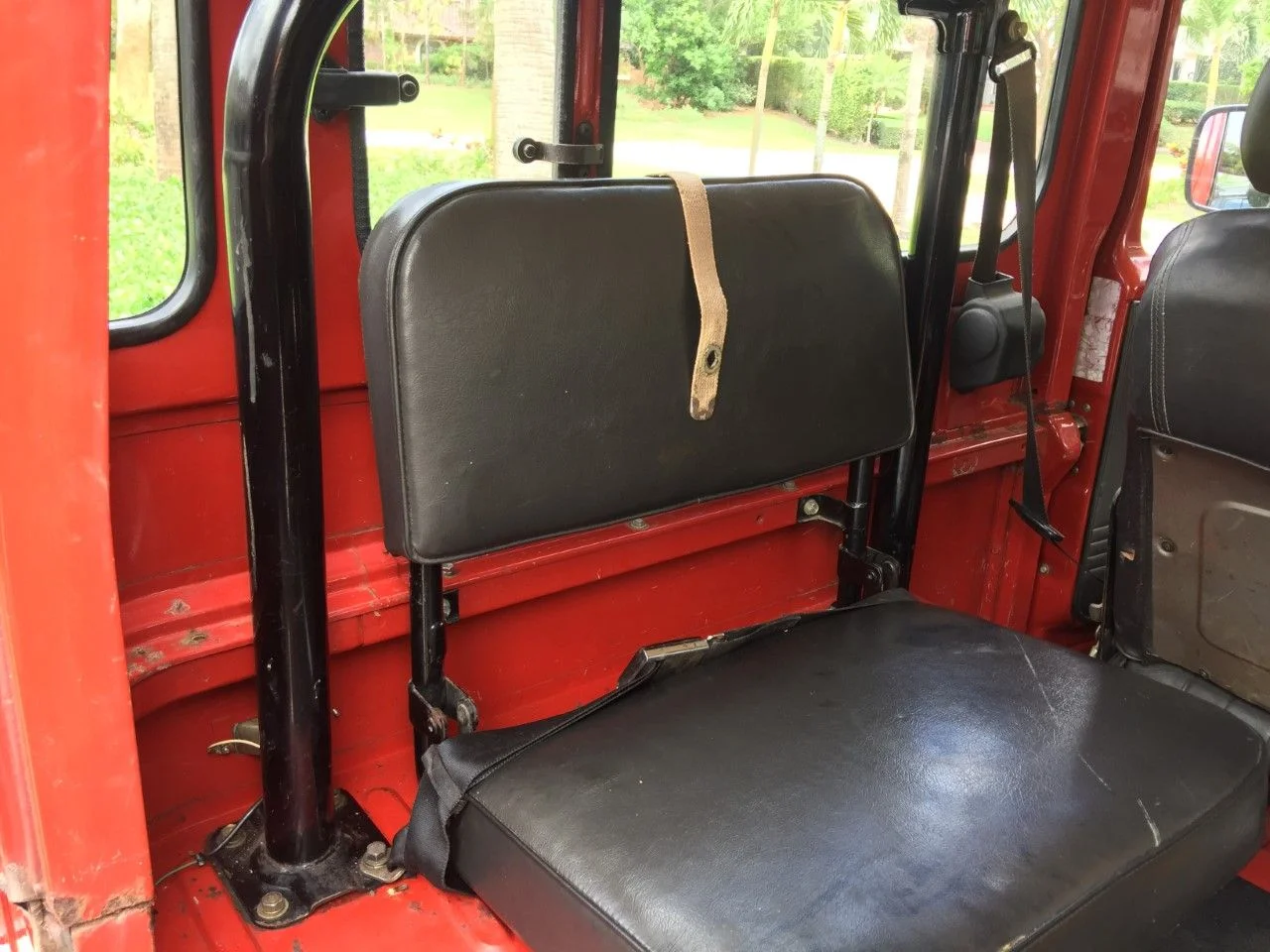 Driver side jump seat.webp