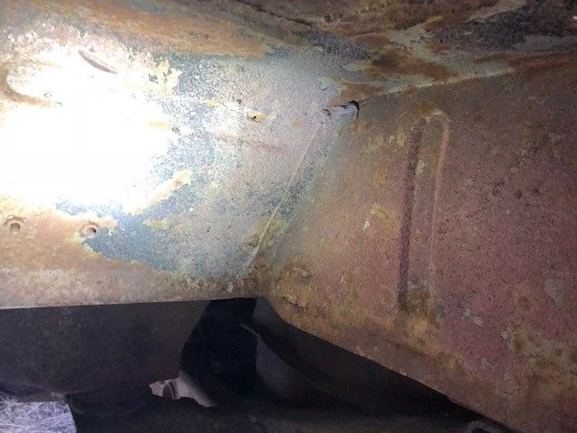 driver's inside front of quarter panel.webp