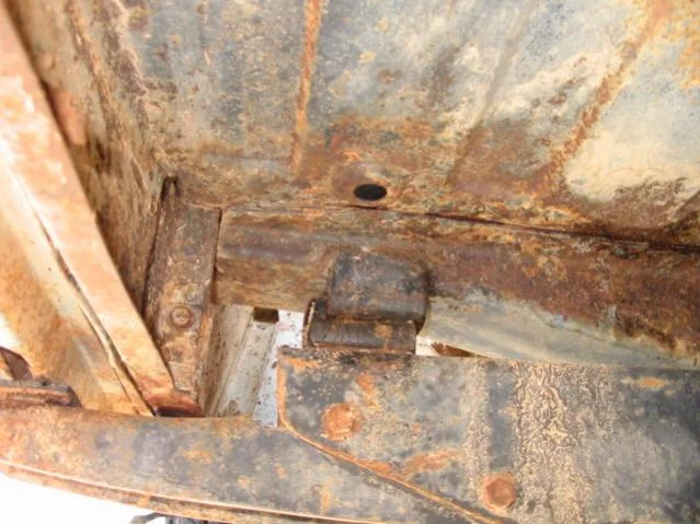 Drivers Side Floorboard underneath.webp