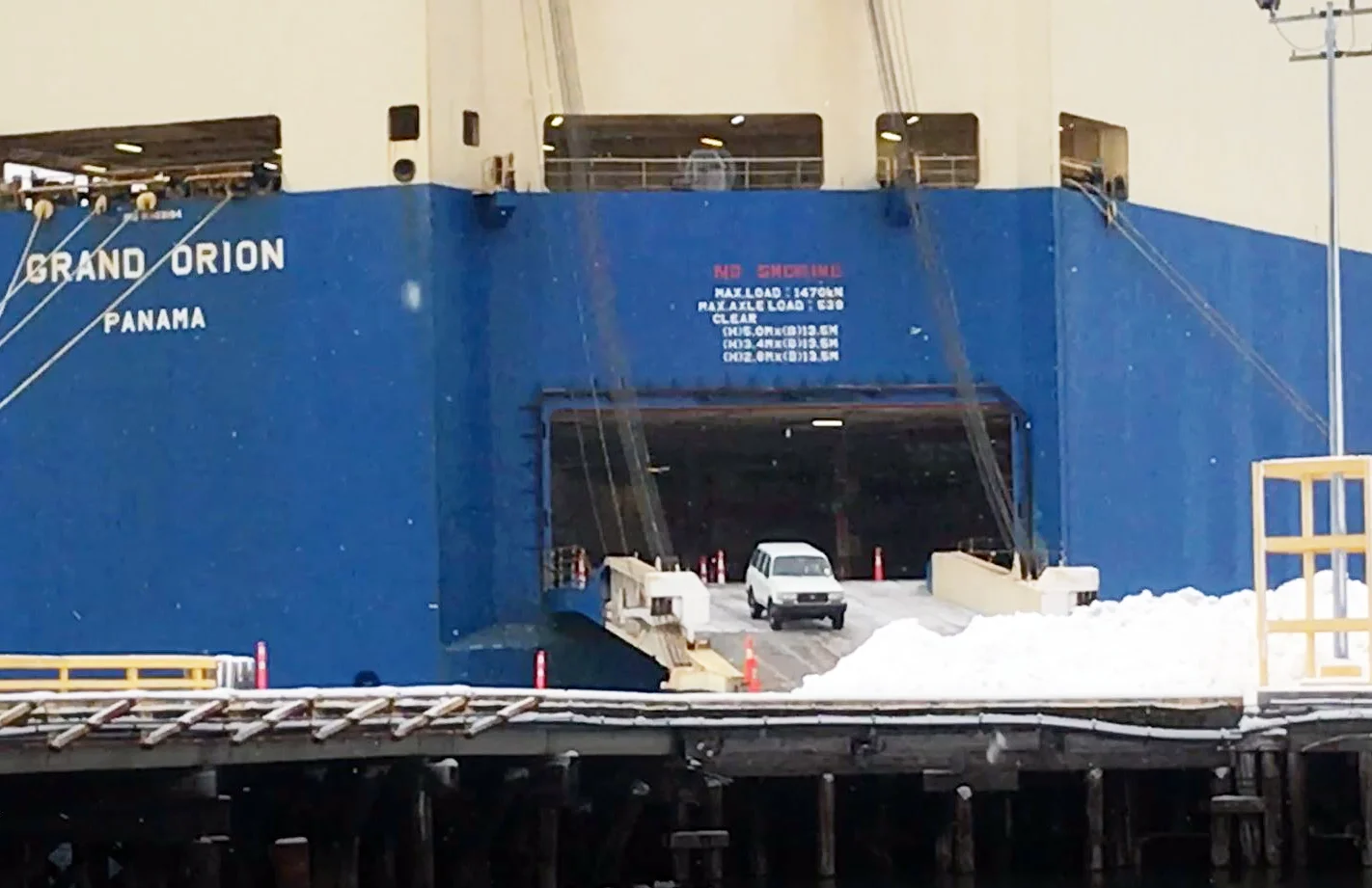 driving off the ship still from video.webp