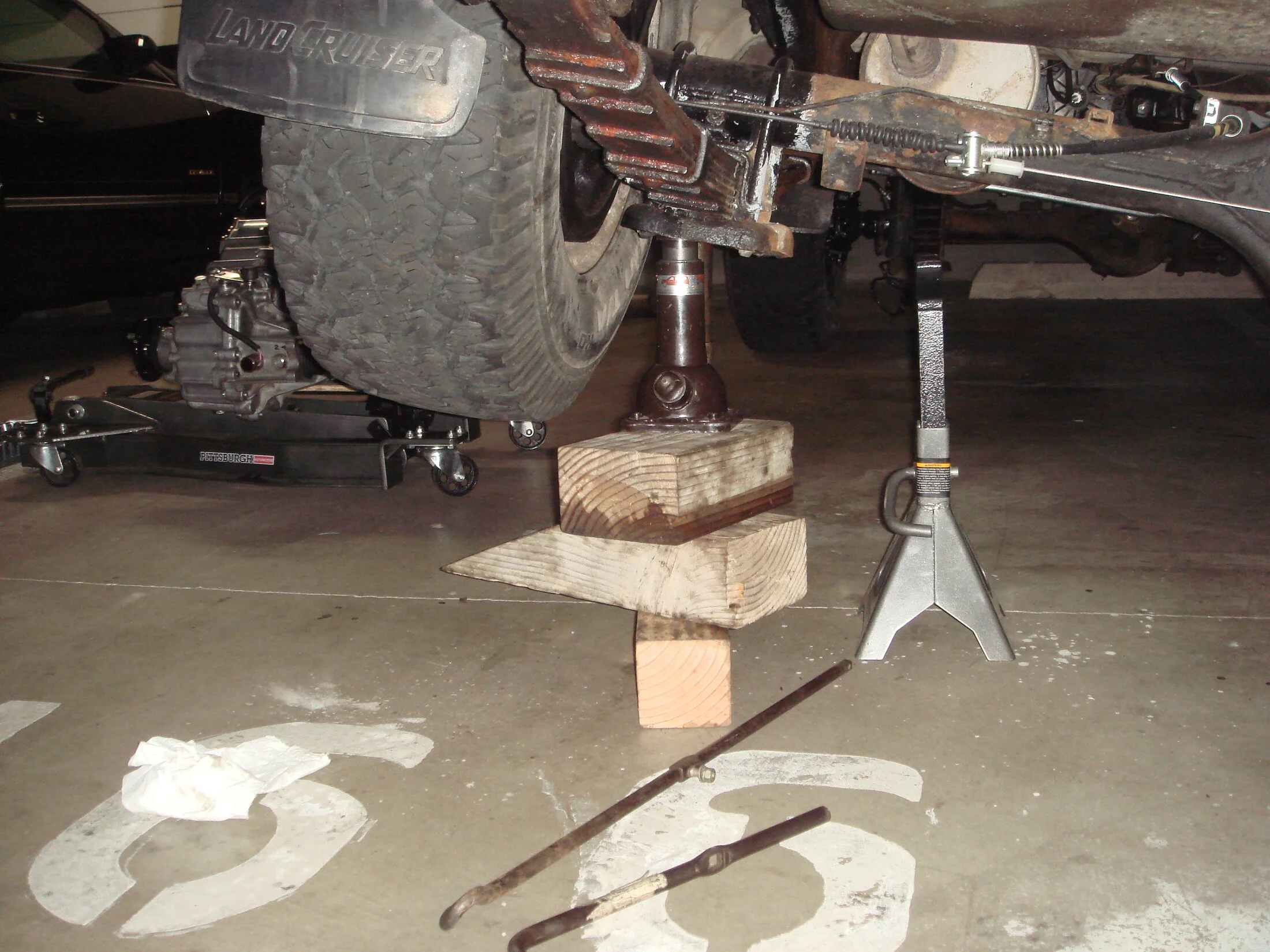 DSC02483 wheels jacked high for tranny install.webp