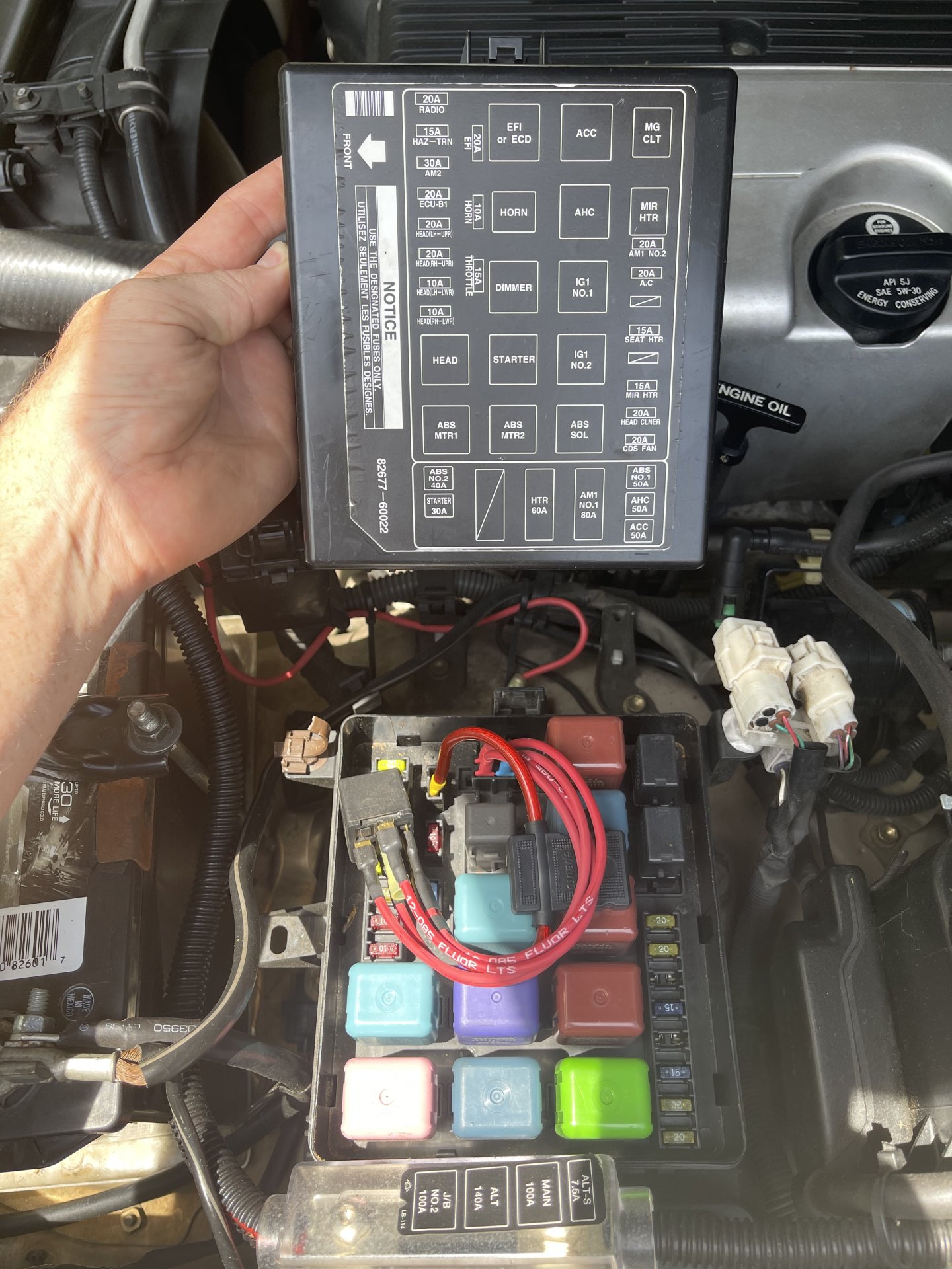 Unknown device plugged into EFI fuse port? | IH8MUD Forum