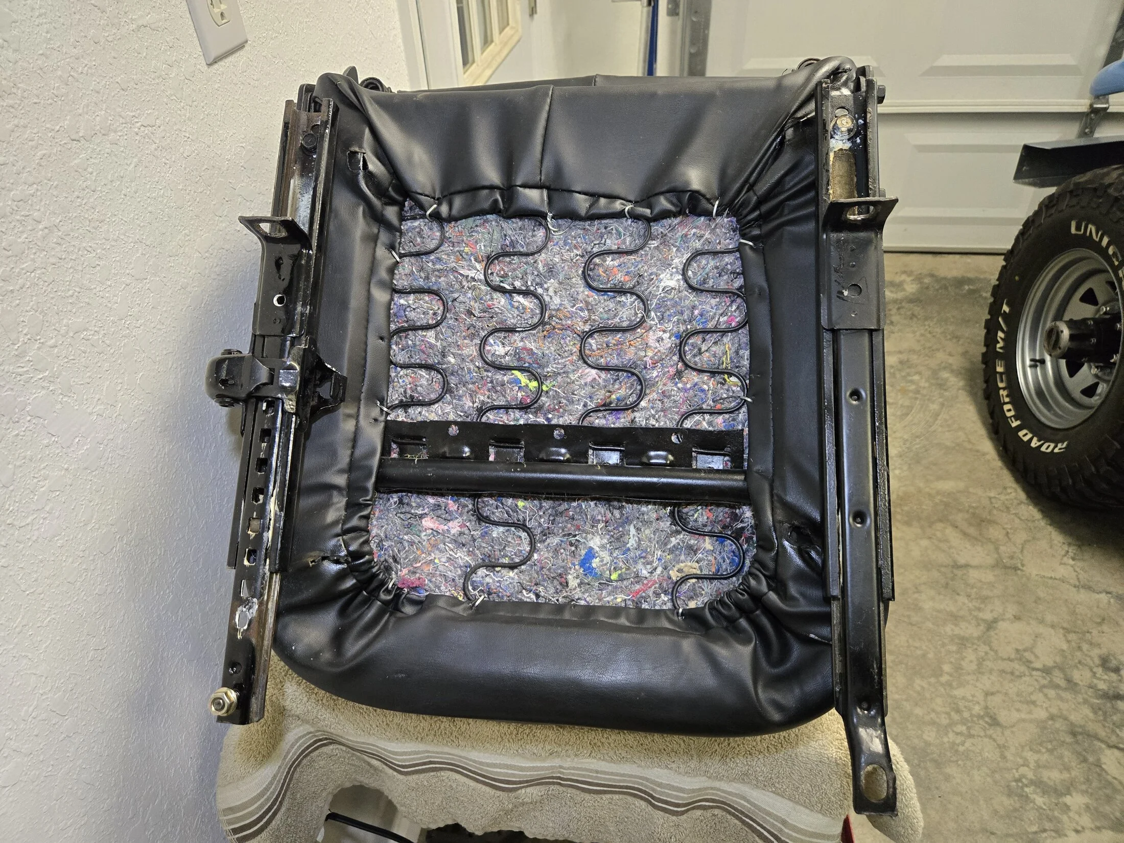FJ40 Driver Seat Bottom Backside.webp
