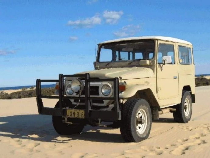 FJ40 on the beach.webp