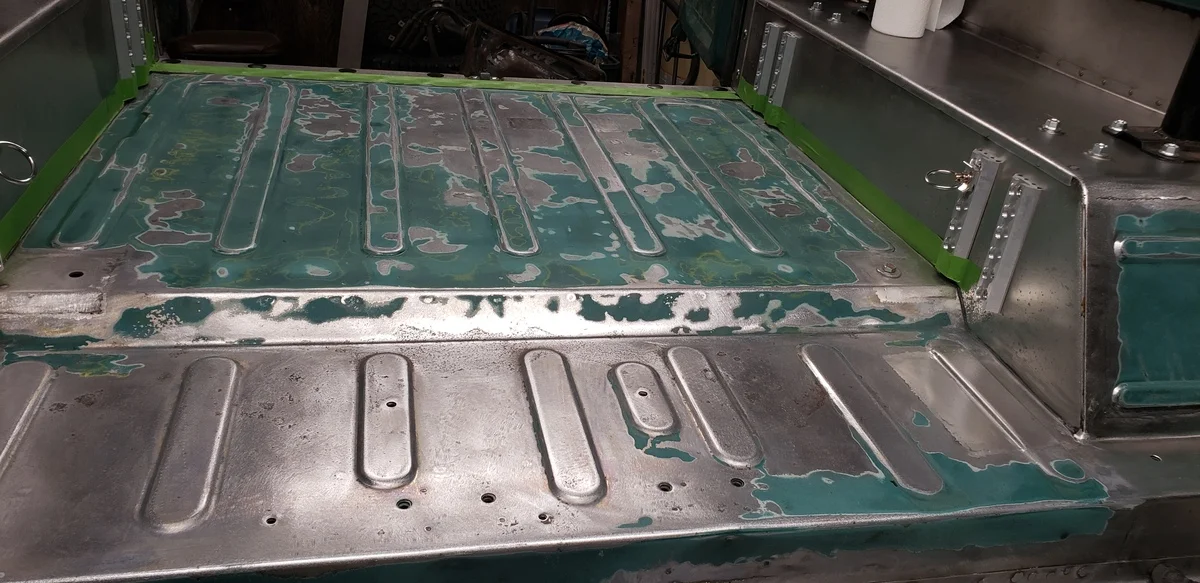FJ40 rear floor, patched, treated, and ready for paint - view from front.jpg