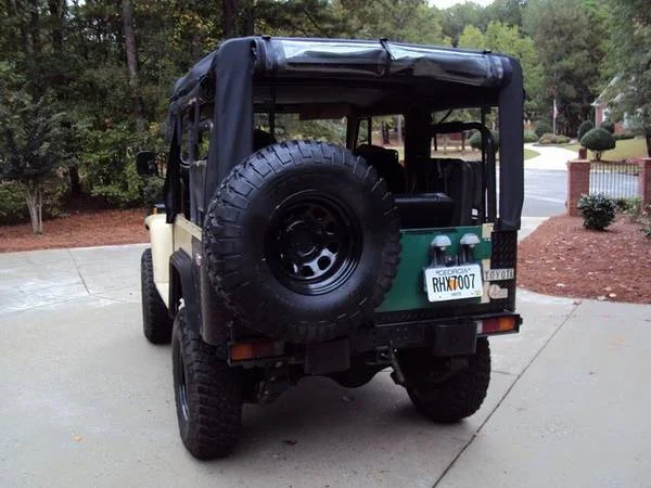 fj40 w soft top Dr side Rear view.webp