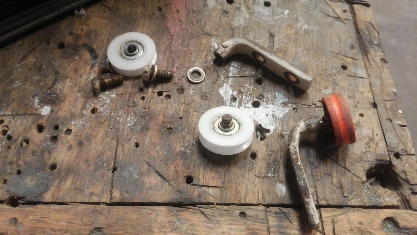 FJ40_Bifold_Door_Rollers_First_Repair.jpeg