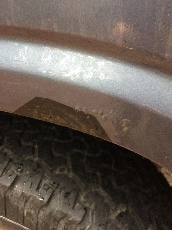 fj60 RUST L rear wheel well.jpg