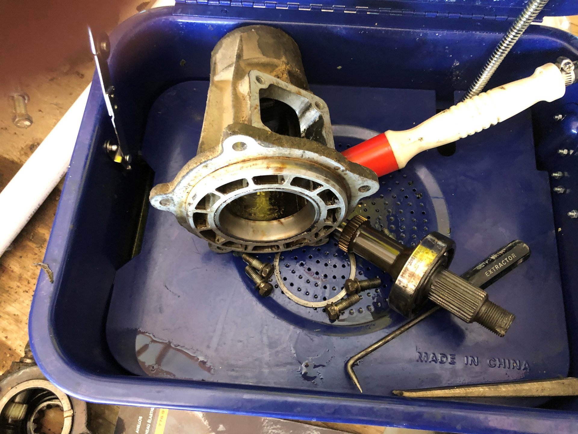 FRONT OUTPUT SHAFT AND CONE READY FOR CLEANING.jpg