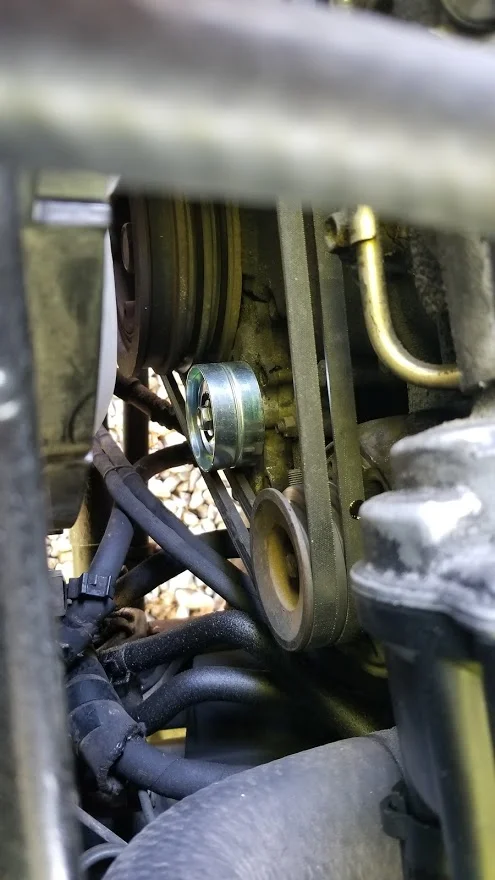 FZJ80 alternator idler pulley installed.webp
