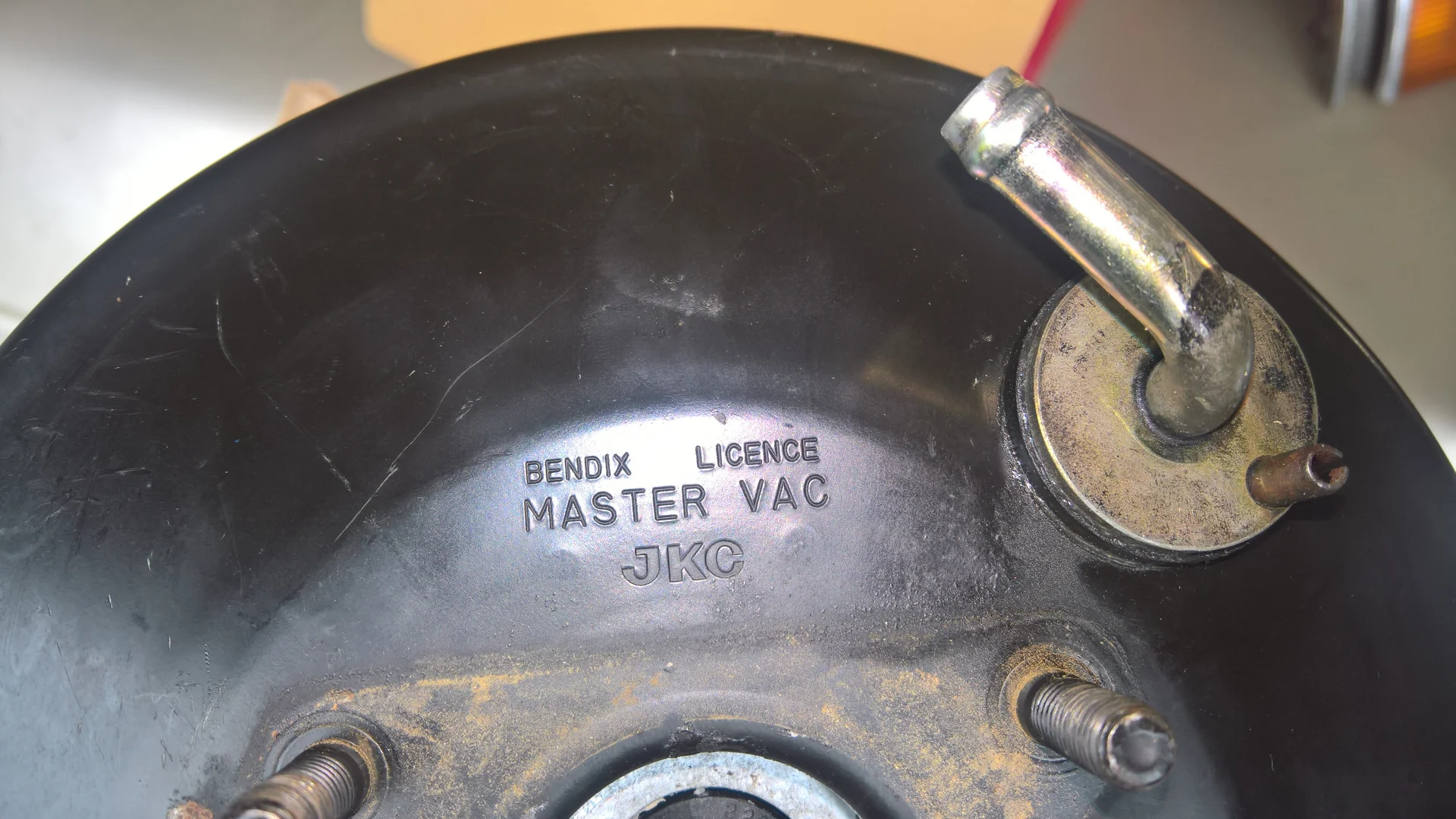 FZJ80 original brake booster front view JKC Bendix.png