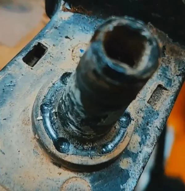 FZJ80 side mirror center post showing steel balls.webp