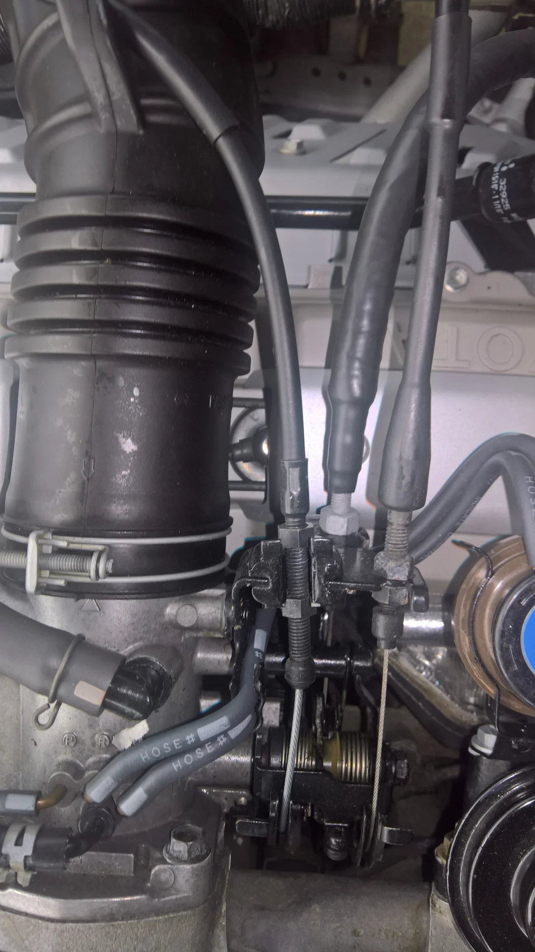 FZJ80 Throttle Body and cables top down view.png