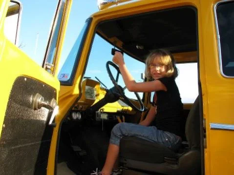 Girl in Mikes truck.webp