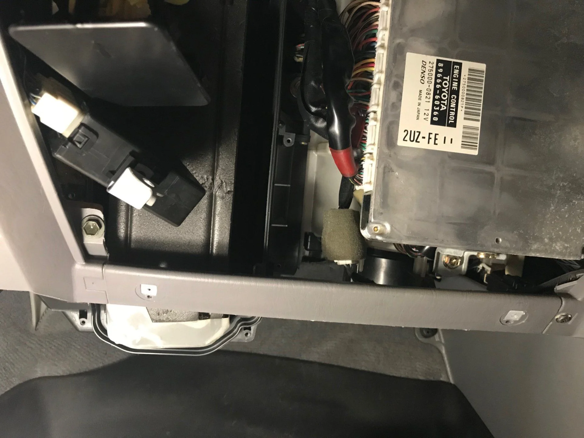 glove box and cover removed.webp