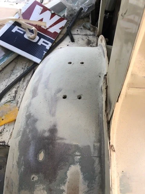 grn white lt interior fender well.webp