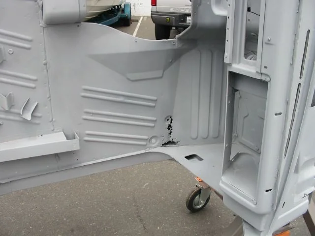 hole in floorboard passanger front.JPG