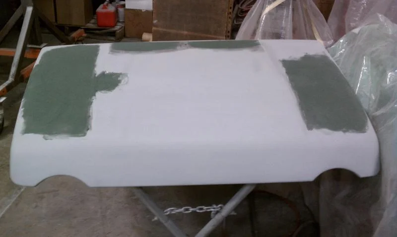 Hood with fiberglass bodywork started.webp
