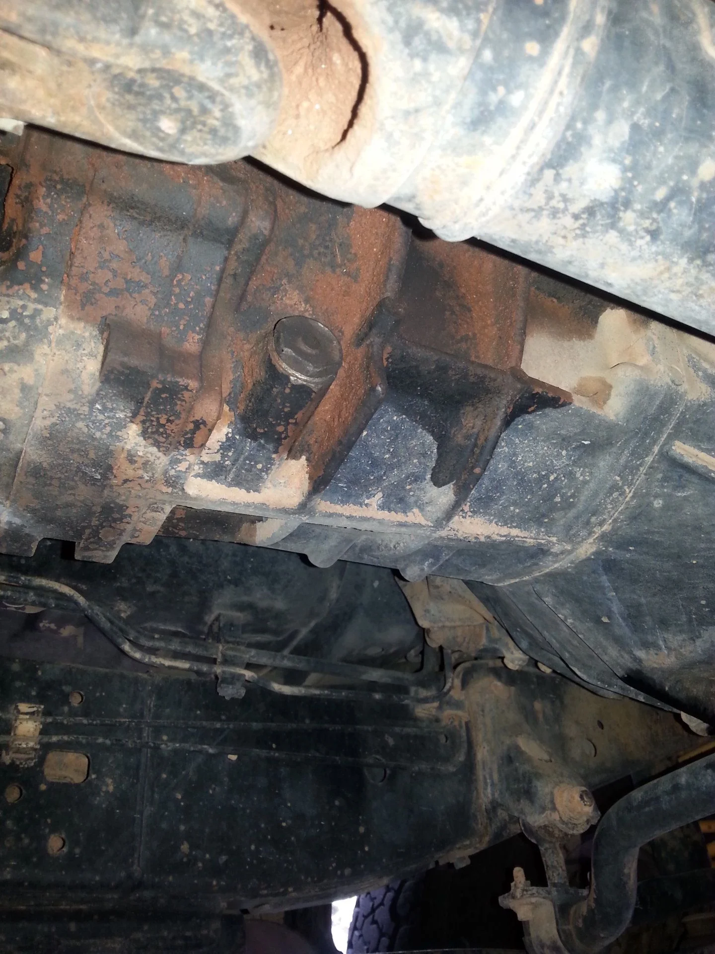 HZJ105 tranny drain.webp