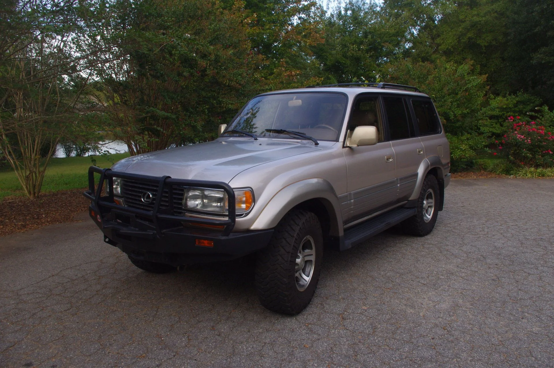 '96 LX-450.  Under 150k miles