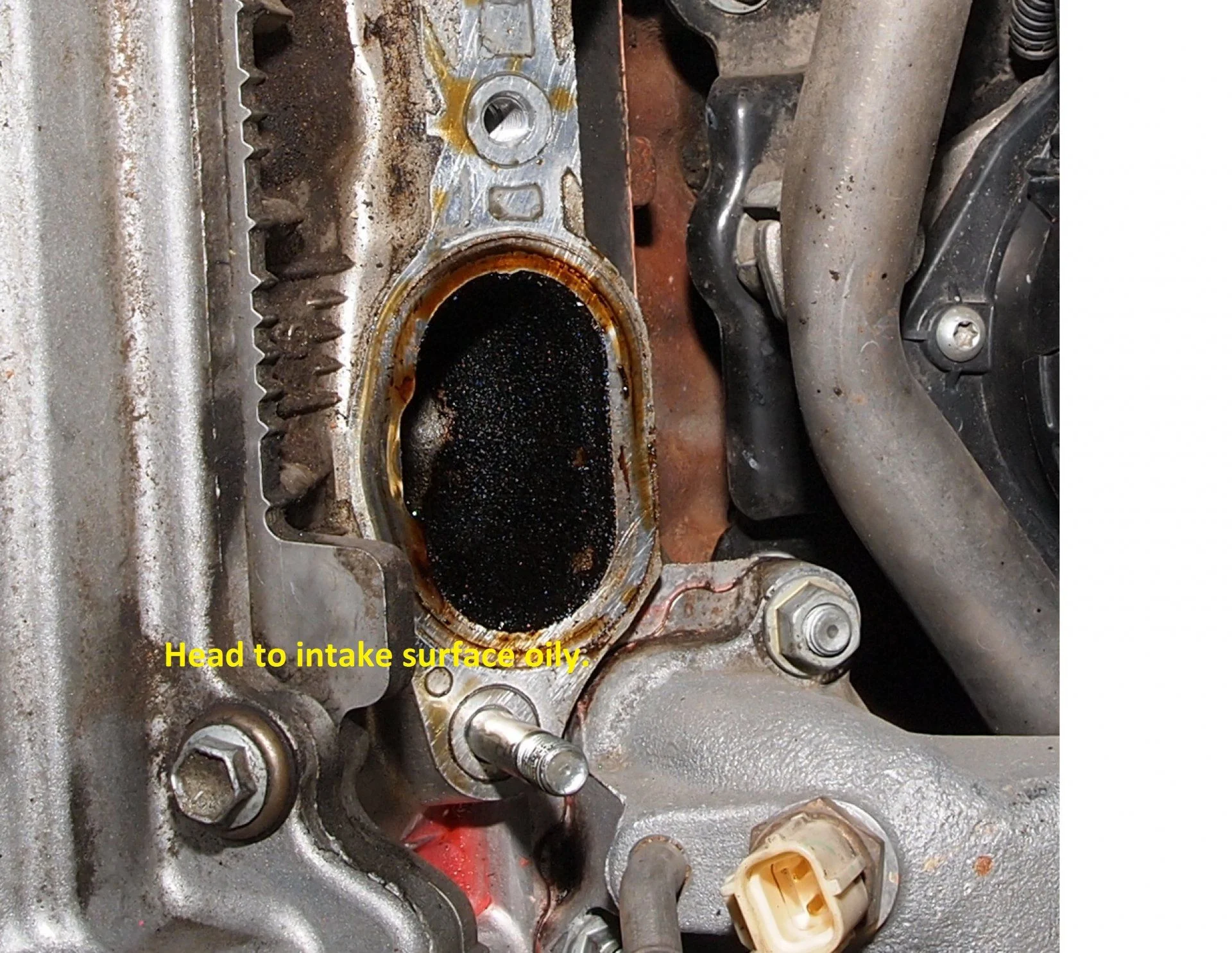 Intake to head sureface oily..webp