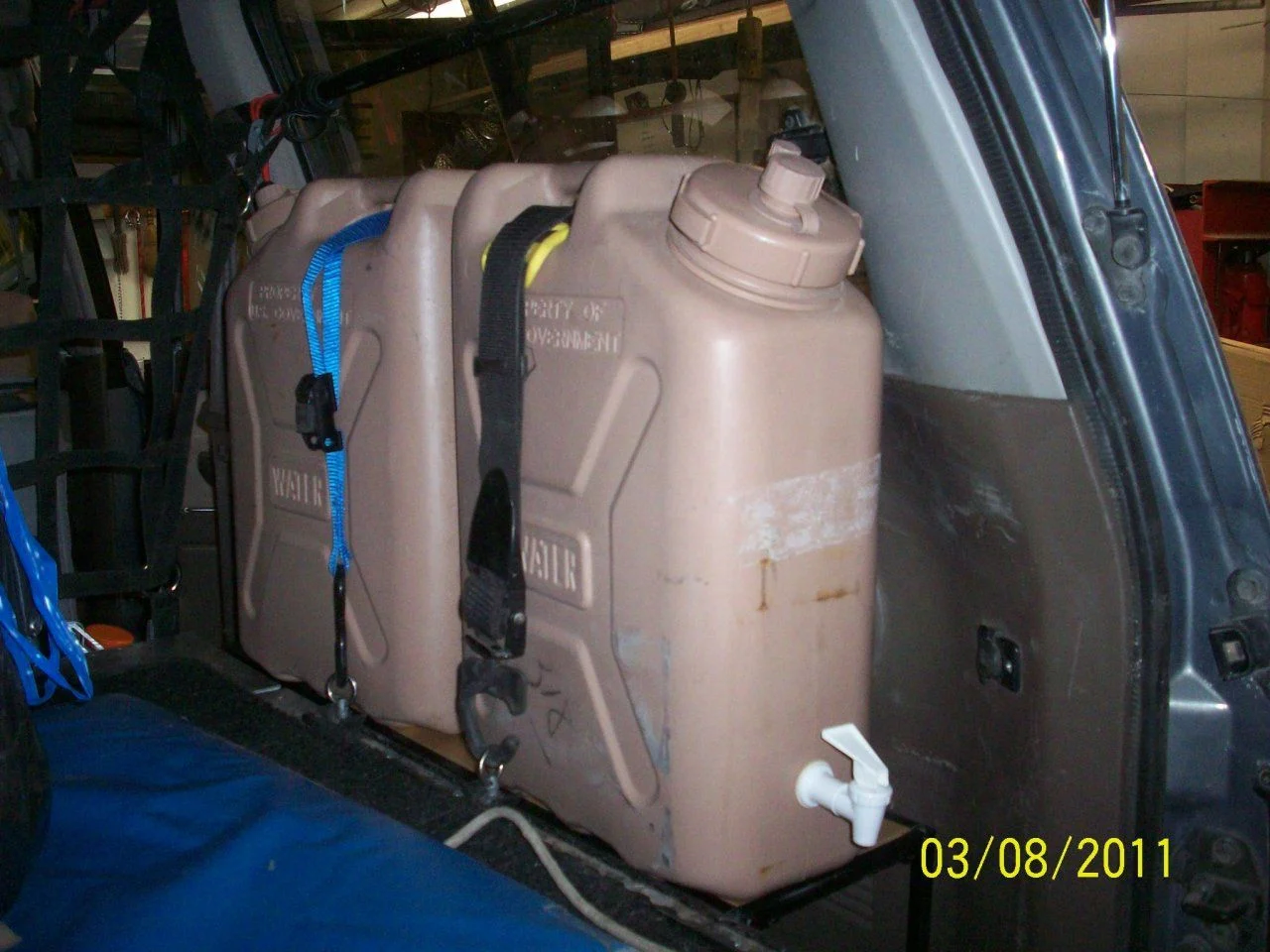 Jerry cans with spigot.webp